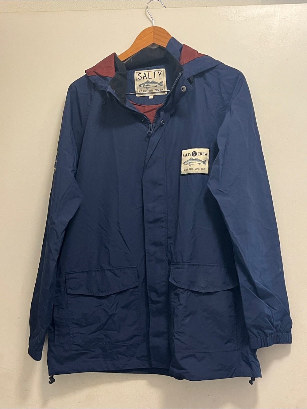 Salty Crew Navy Hooded Raincoat with Maroon Lining Patch